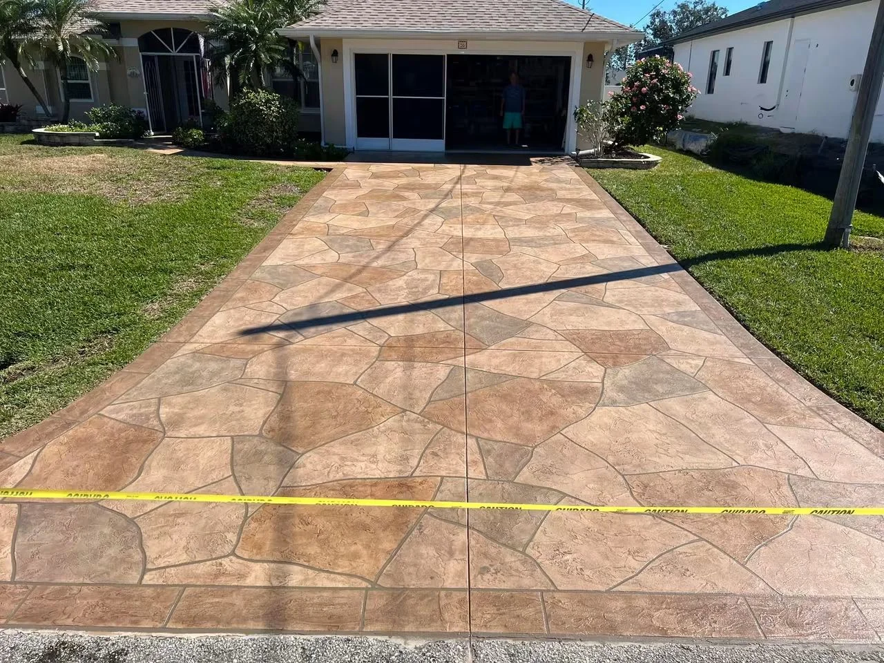 Sealed paver driveway with clean, uniform appearance
